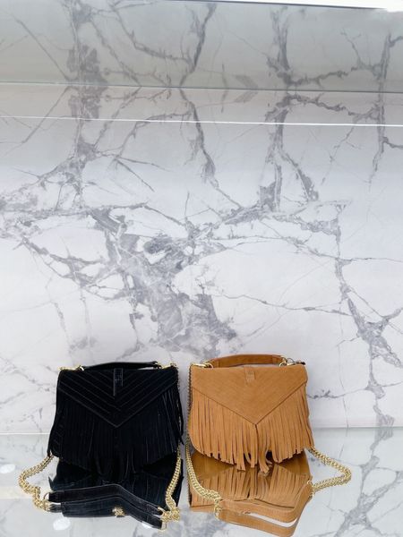 

fashion versatile one shoulder crossbody commuter bag in autumn and winter high sense portable women's armpit tassel bag