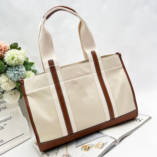 

2022 luxurys shopping beach womens shoulder bags underarm bag fashion women handbags canvas crossbody totes black brown handle purses