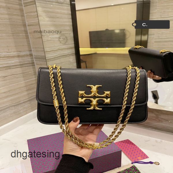 

bags torysburchs monograms kiras evening bag designers 2022 hand small gold brick cowhide flap chain