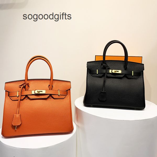

designer bags luxury genuine leather herme women's handbags 2022 new leather handbag women's litchi patterned head layer cow bag 3