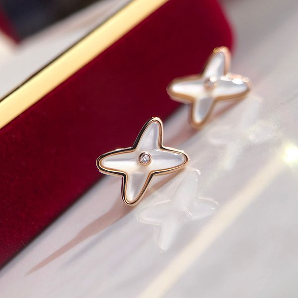 

v gold material luxury quality charm stud earring in rose color and nuatre shell beads have stamp ps7254a, Golden