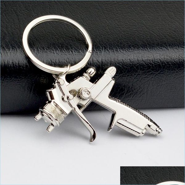 

keychains water spray gun keychain handbags men creative car bag key ring accessories pendant usef chains drop delivery 2 dhseller2010 dhfd1, Silver