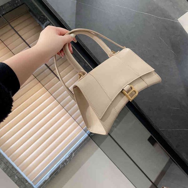 

italy balencaigass handbag designer buckle b gold high version hourglass milk tea color hand carrying messenge