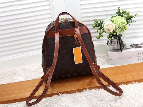 

outdoor packs 23ss mens backpacks women's handbag leather gril bags fashion brown letter crossbody bag