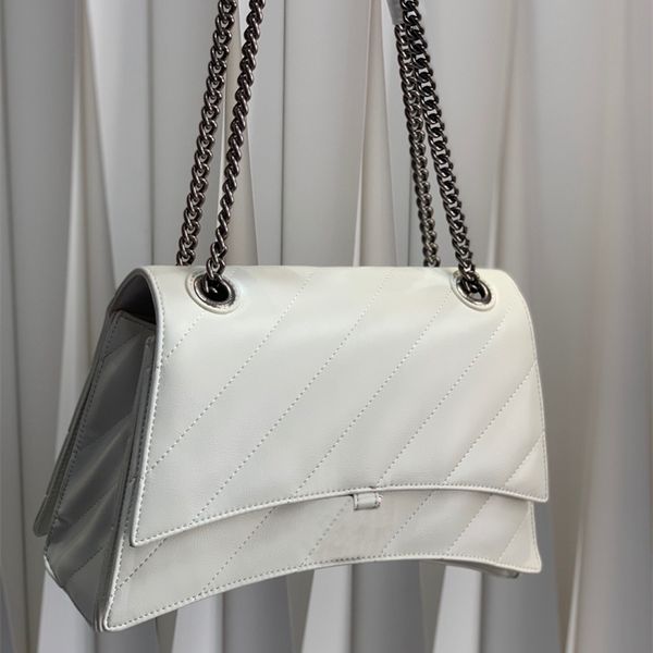 

crush chain bag quilted crushed calfskin matte hardware designer curvilinear base handbag flap studded magnet closure black white crossbody