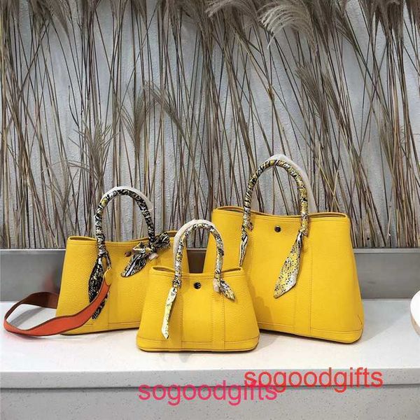

garden party bags women crossbody herme designer tote handbags garden baotou leather with litchi pattern and canvas shoulder str