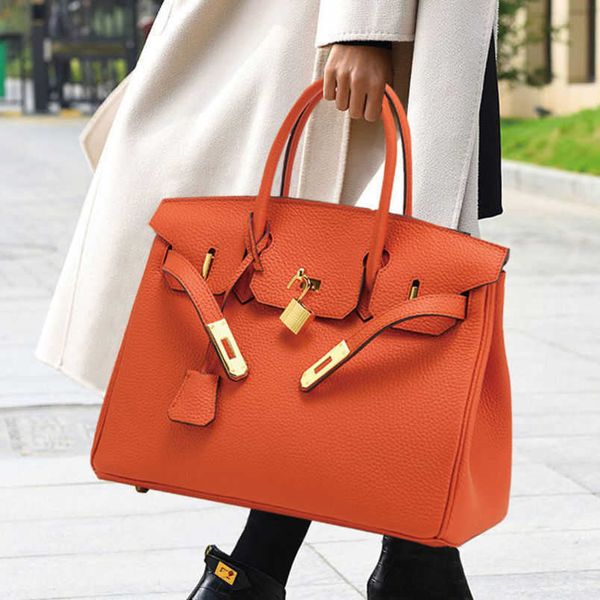 

designer birkins bags herme qiandian first layer leather 2022 new womens bag large capacity hand temperament lychee pattern