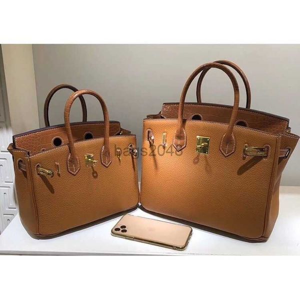 

evening bags 22ss herme designer handbag new leather womens bag crocodile pattern splicing lychee pattern large capacity first layer leather