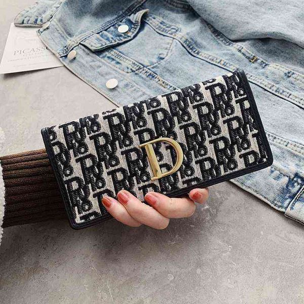 

factory outle wholesale autumn and winter 2022 new cloth face long folding women's multi card wallet change bag fashion, Red;black