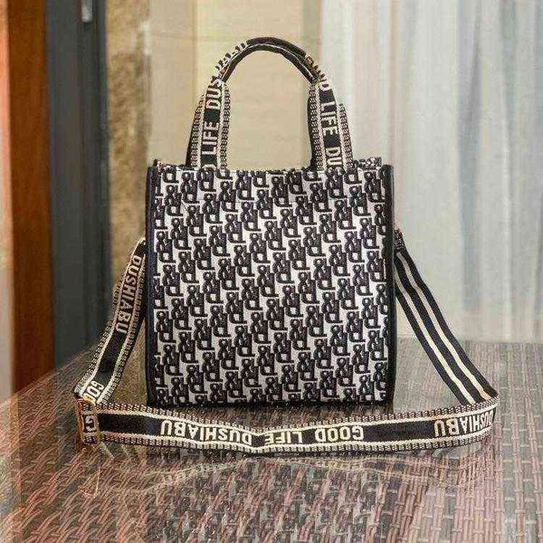 

portable women's bag hand bag oblique back mommy bag capacity shopping