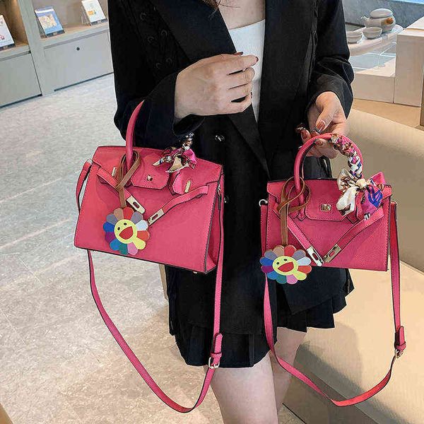 

handbags bag female 2022 new litchi pattern portable temperament lock messenger