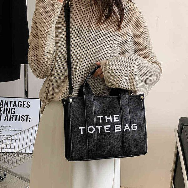 

the tote 2022 summer new tote bag hand women's bag fashion niche