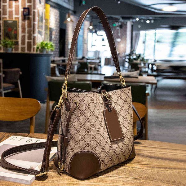 

handbags bag female version bucket printed single shoulder texture oblique cross 2022 new trend