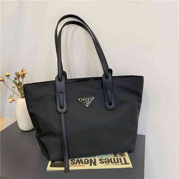

factory online shop 58% off one shoulder large bag summer new triangular label lightweight waterproof canvas handbag women's tote bag