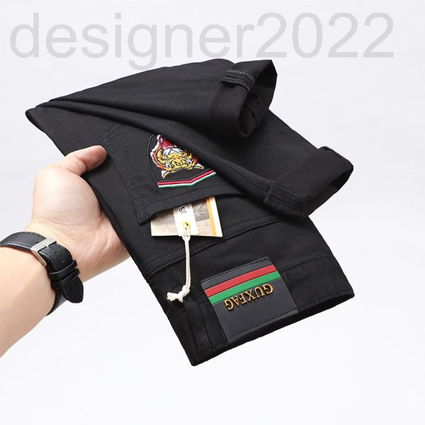 

men's jeans designer the year of the tiger is limited to spring. head embroidered black jeans are for men. fashion trend versatile and, Blue