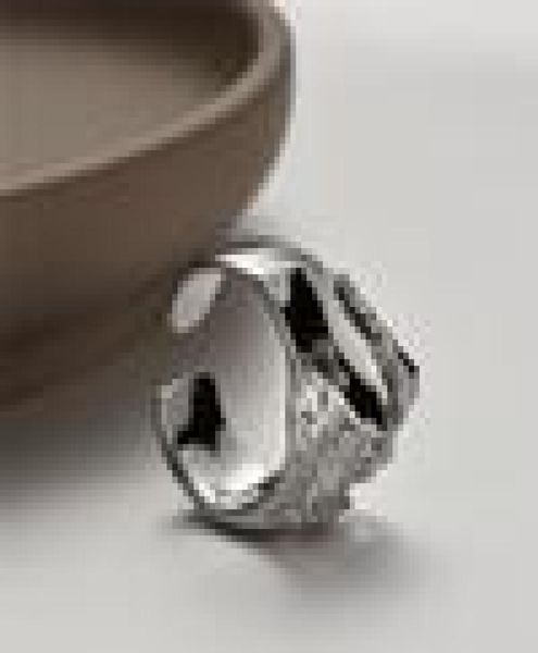 

sterling ring with men women 1 ring, White