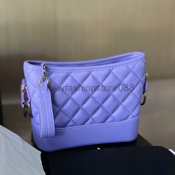 

womens quilted designer bag premium calfskin gold and silver panel hardware chain zippe