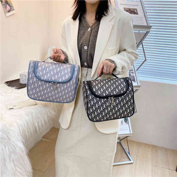 

65% off online sale wholesale net red cosmetic 2022 new old flower waterproof wash bag portable storage bag large capacity tourism products