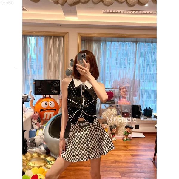 

women's sweaters designer chao brand 22 spring / summer new black sleeveless drill lapel bow knit sweater sweet vest, White;black