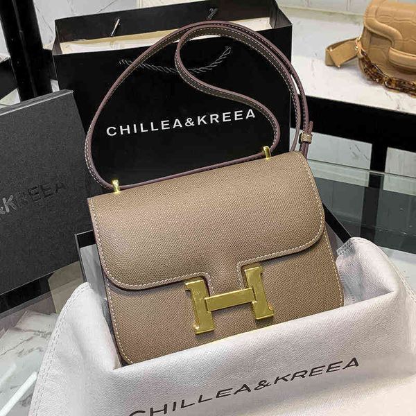 

herme bags 2022 new fashion high sense tofu bag women's versatile one shoulder messenger h buckle kangkang stewardess