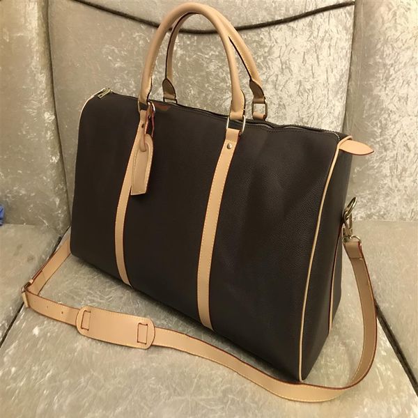 

54cm large capacity women travel bags 2021 quality men shoulder duffel bags luggage bottom rivets with lock head324j