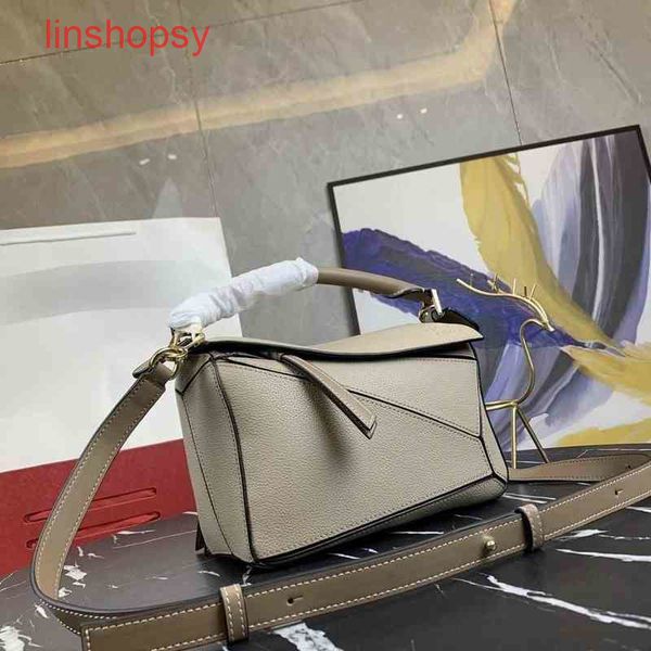 

explosive handbags loews crossbody bags cowhide litchi grain geometric stitchi