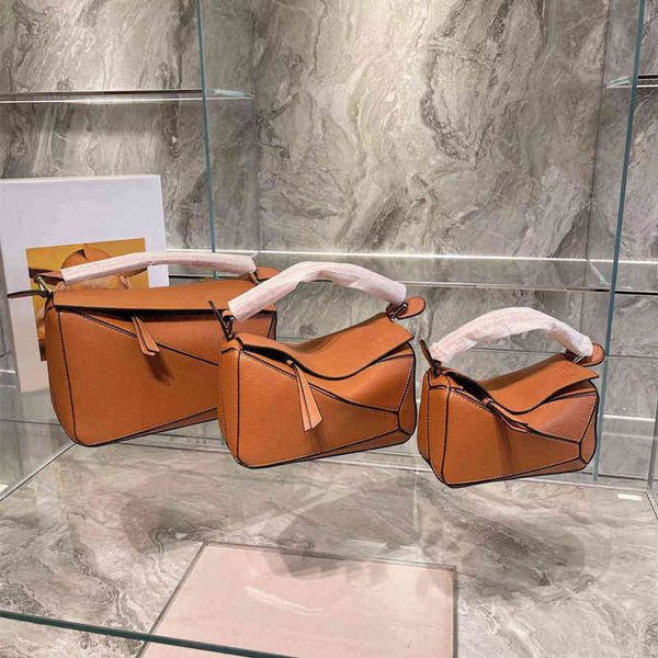 

designer woman bag family loews leather bags single geometric portable color s