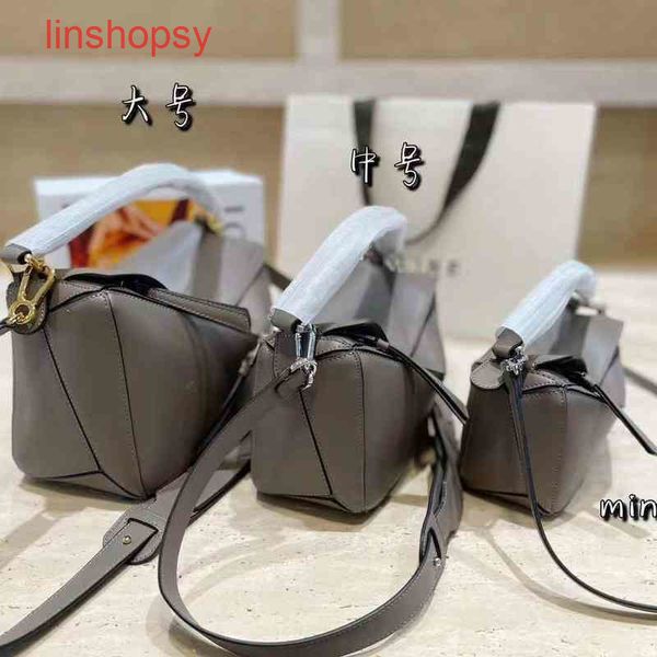 

handbags women loews designer bags geometry package rowe's puzzle