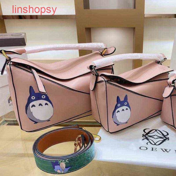 

handbags loews crossbody designer bags classic puzzle anagram geometric color
