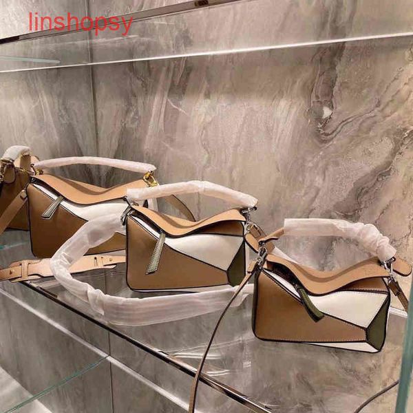 

handbags loews crossbody designer bags leather puzzle cowhide matching geometr