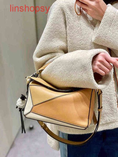 

explosive handbags loews crossbody bags 2022 milk tea color matching full cow