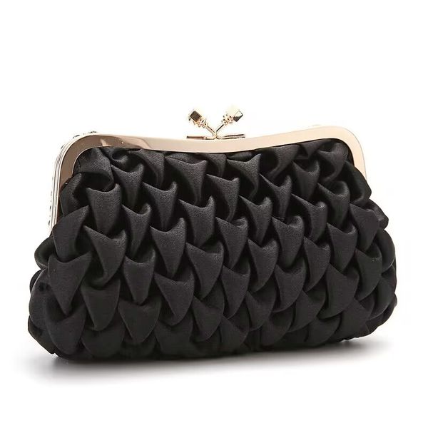 

hand holding evening dress bag wedding bridesmaid sequin glitter elegant small bag