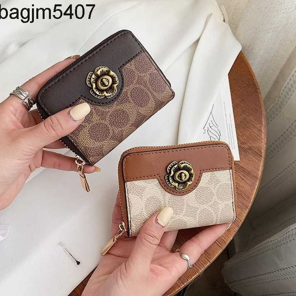 

design bag ladies purse wallet women's short 2023 new solid color single zipper multi-layer hand wallet card all-in-one women's