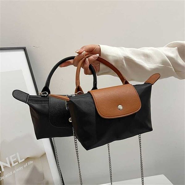 

hong kong hand-held canvas bag 2022 new women's summer high-grade texture niche messenger dragon