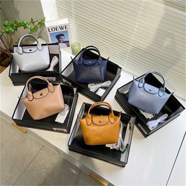 

2022 new mini dumpling bag sheepskin handbag simple fashion one shoulder oblique straddle women's cosmetic