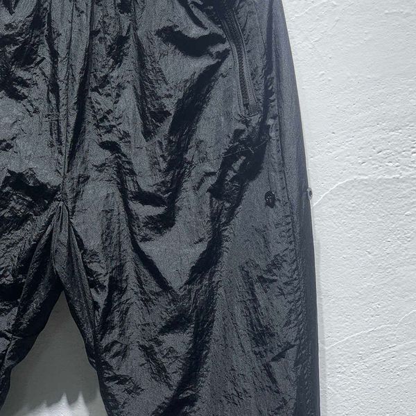 

men's pants 22ss side patch embroidery pants men women metal nylon sweatpants quick-dry breathable compass badge pants men black/silver