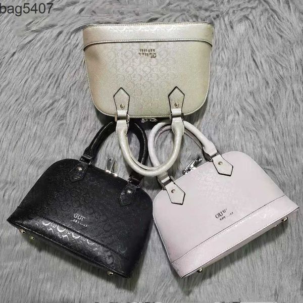 

store discounts are 55% design small square bag gs guejia new light glue solid color simple embossed letter shell bag handheld one shoulder