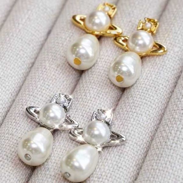 

designer vvan earrings vivi queen saturn pearl earrings female net ins silver planet small delicate, Golden