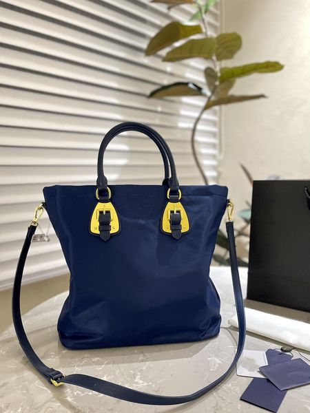 

2022 blue classic handbag is the first choice for any party dress