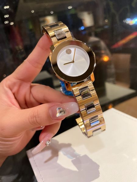

designer womens watch swiss movement stainless steel case strap crystal glass simple generous size 36mm, Slivery;golden