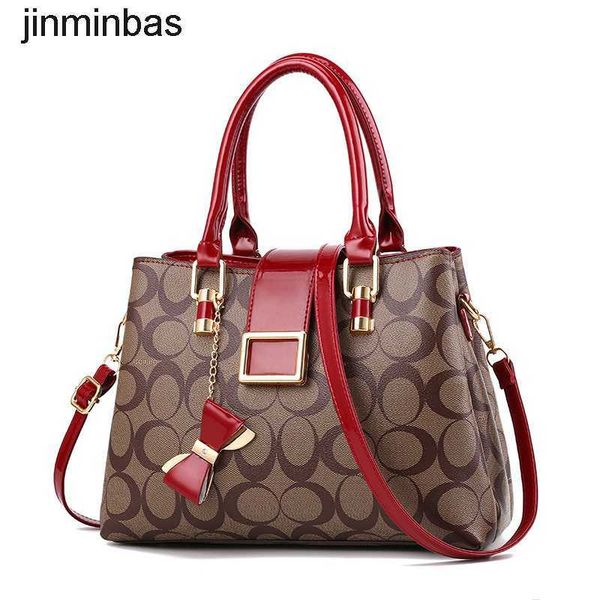 

50% discount in stores 2023 fashion bag printed texture bow large capacity leather contrast style women's