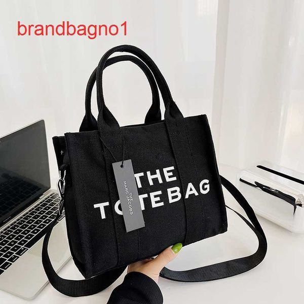 

designer totes bags price canvas handheld women's 2023 new winter diagonal cross tide shoulder small crowd tote