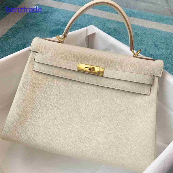 

designer herme kely bags for women price spring and summer new first layer cowhide new litchi pattern bag 25 "28" portable messen