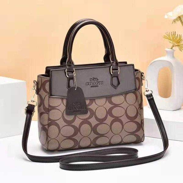 

2023 trendy brand fashion a woman's bag autumn women's new hand pattern single shoulder cross large capacity mother's