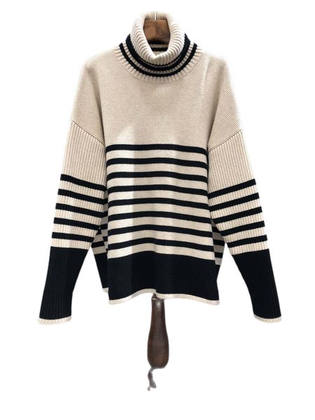 

the latest high neck sweater in autumn and winter is warmsimplefashionable and loose, White;black