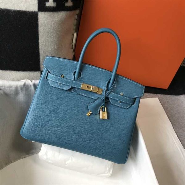 

herme designer handbag herme bag luxury genuine leather woman tote litchi pattern pochette rouge togo with gold hardware zc yofl