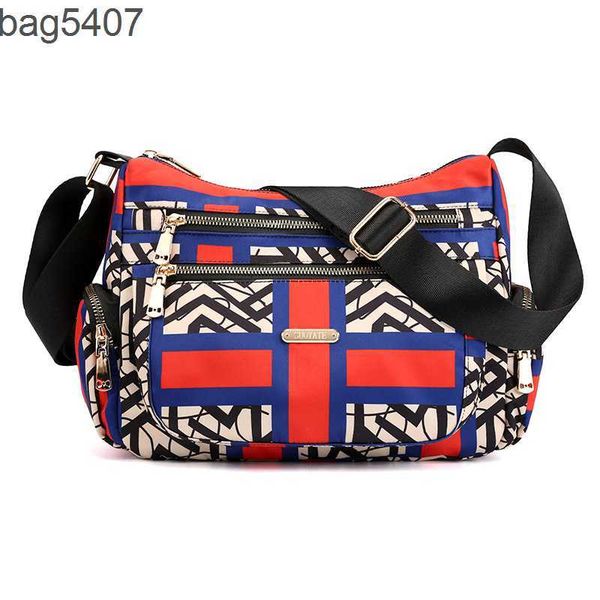

2023 design bag stores 70% wholesale and retail fashion nylon msenger floral cloth waterproof oxford go to work women's light travel sh
