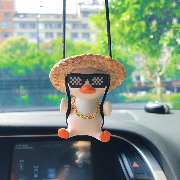 

interior decorations cute anime swing gypsum duck car interior decoration big head duck with sunglasses rearview mirror pendant for car acce