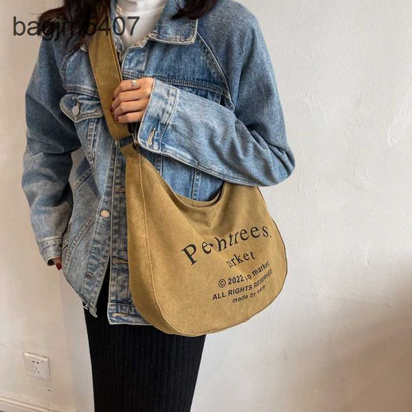 

2023 new hand bag factory 80% wholesale and retail letter canvas women new american shoulder large capacity student tote fashion