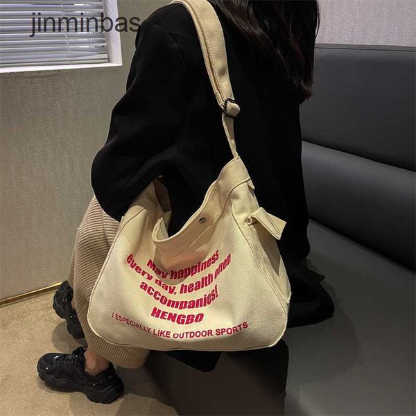 

2023 new hand bag factory 80% wholesale and retail crossbody canvas women fashion american shoulder large capacity student